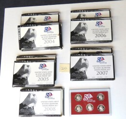 222. Nine U. S. Mint 50 State Quarters silver proof sets, two 2004, two 2005, two 2006, two 2007 and one 2008