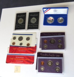 229. Lot two Eisenhower proof dollars 1974, two 1987 uncirculated coin set,