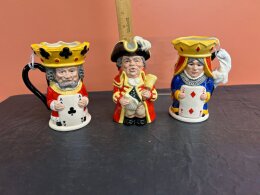 104. Three (3) Royal Doulton Tobys - King And Queen Clubs - King And Queen Diamonds - Town Crier